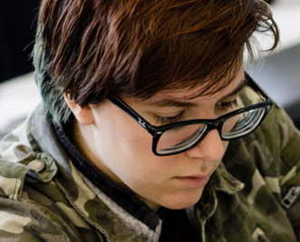 Cornell College student in a classroom