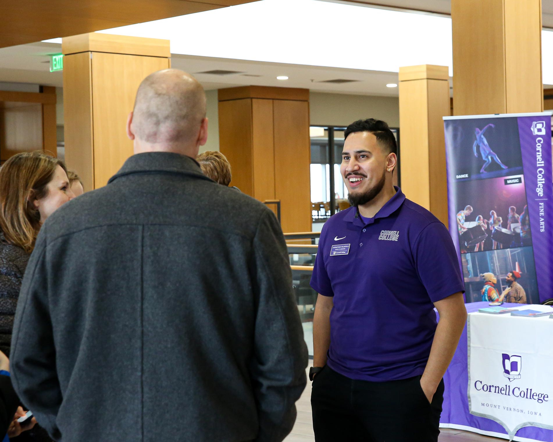 admission counselor meets with a family