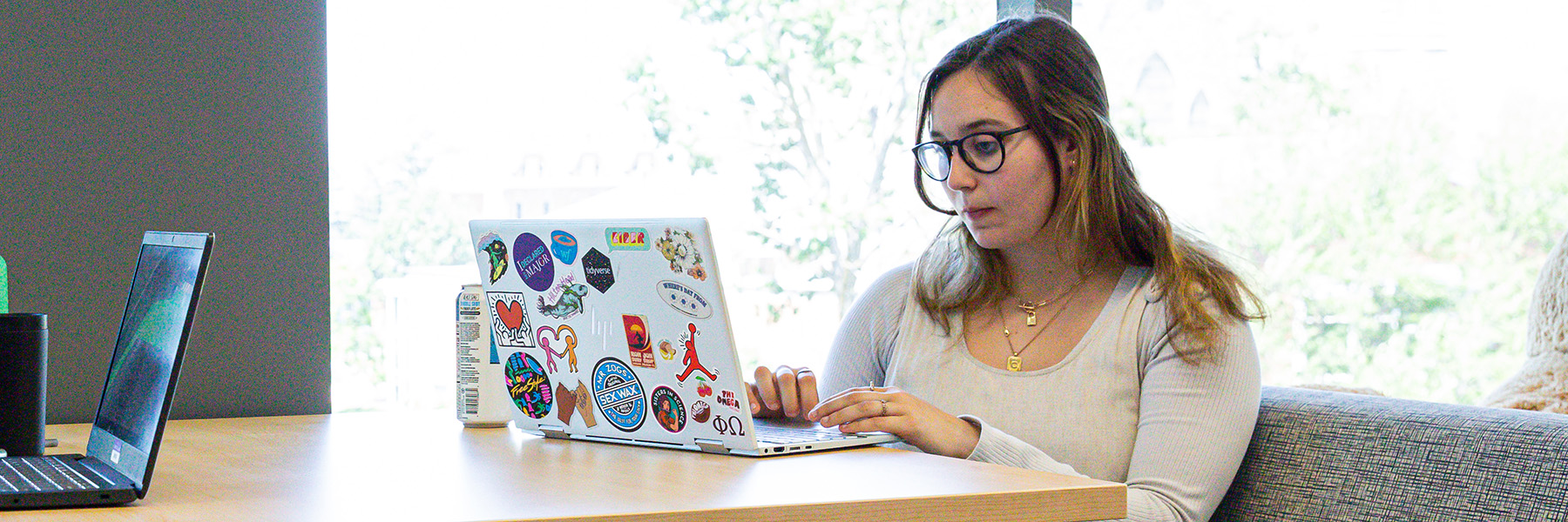 Student accessing digital course materials on a laptop.