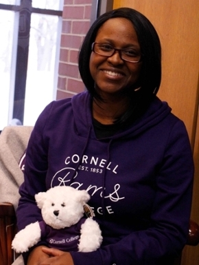 Cornell student wears a Cornell sweatshirt. 