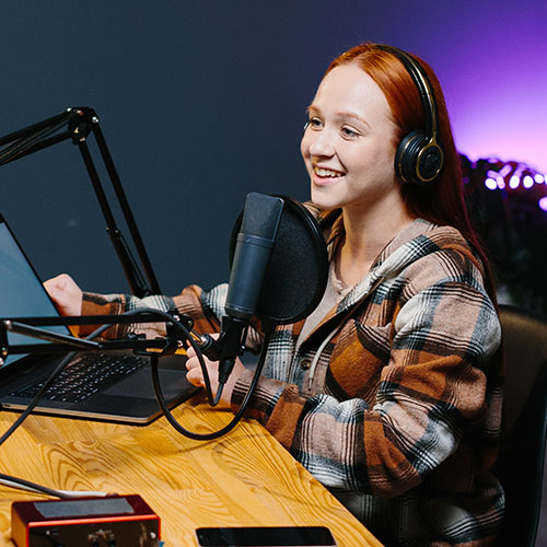 Student recording a podcast