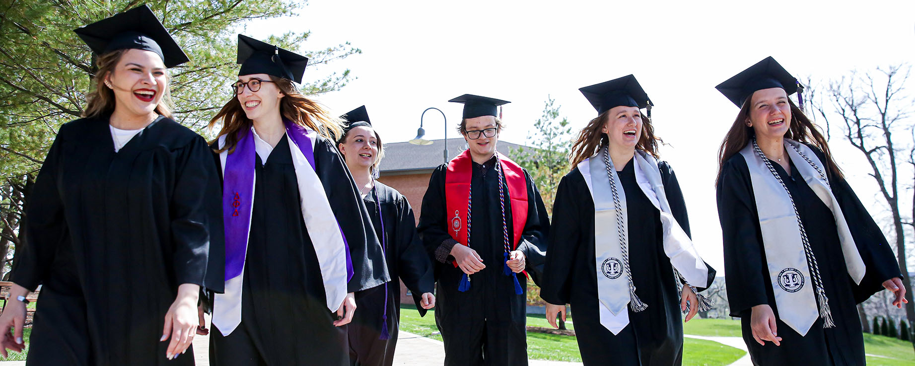 Graduates on the ped mall walking together