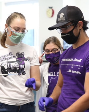 Cornell College students interested in health and medical careers working in a lab