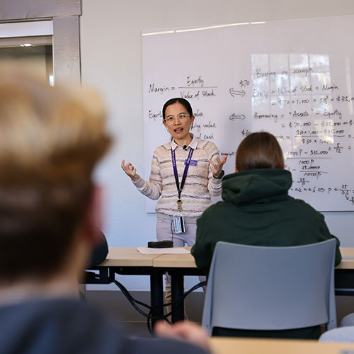 Professor in business classroom lecture