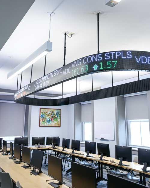 Cornell College Finance Lab features an overhead ticker
