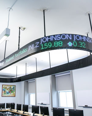 Cornell College Finance Lab features an overhead ticker
