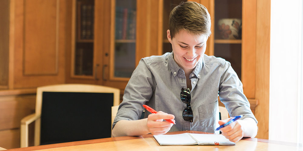 Faculty teach students in business and economics class at Cornell College. 