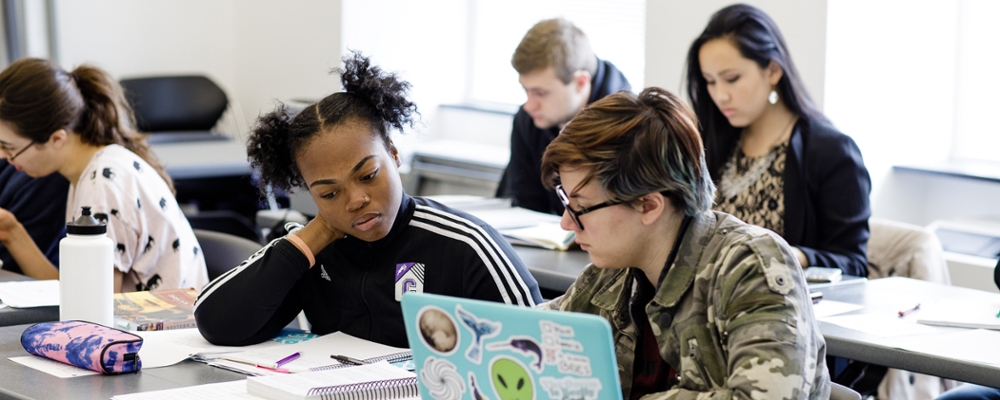 Cornell students work on a project.