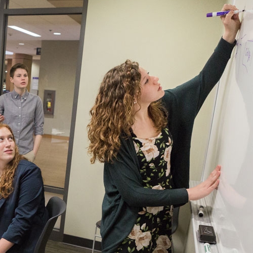 Cornell student presents in class