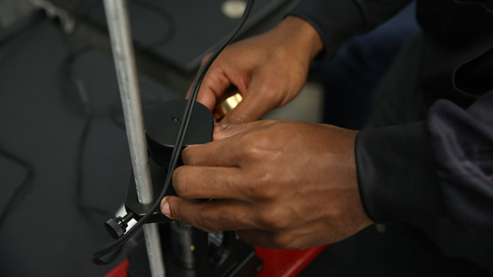 Cornell College engineering student works on a hands-on project in the classroom