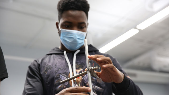 Cornell College engineering student works on a project