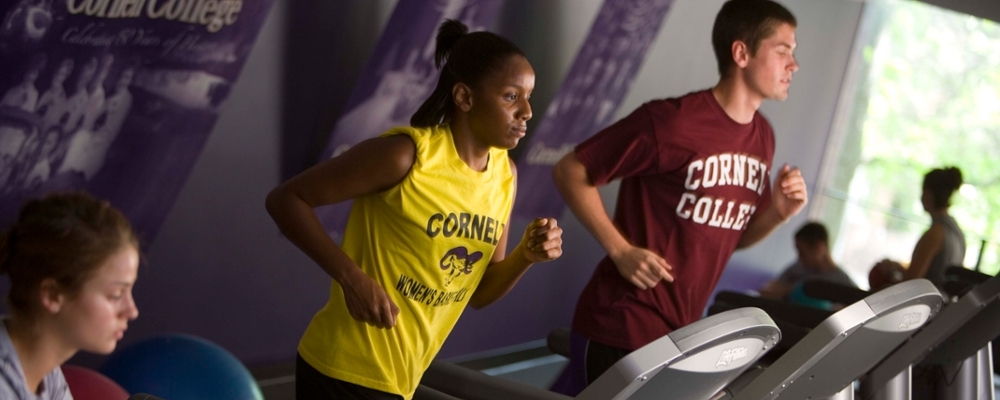 Cornell students work out in the gym
