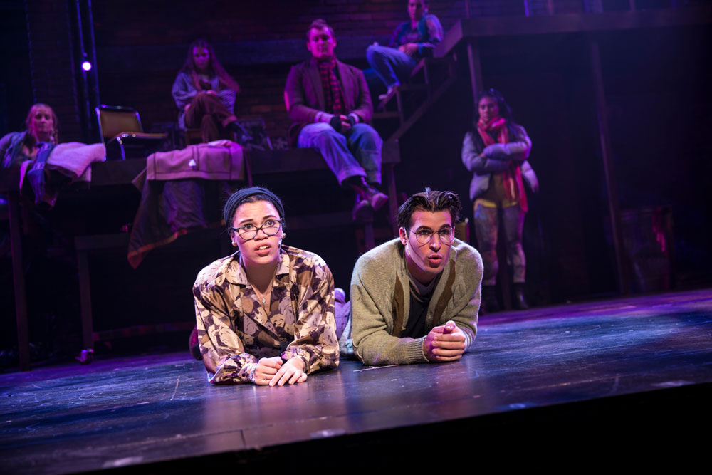 Cornell students perform Rent on stage. 