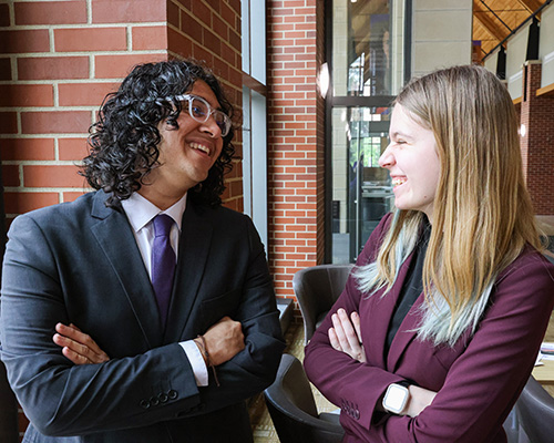 Mock trial teammates sharing a joke.
