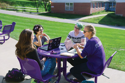 Cornell College students gather at an outdoor hangout spot. 