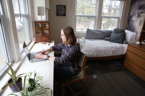 A student is studying in his dorm room at Cornell College in Mount Vernon, Iowa.