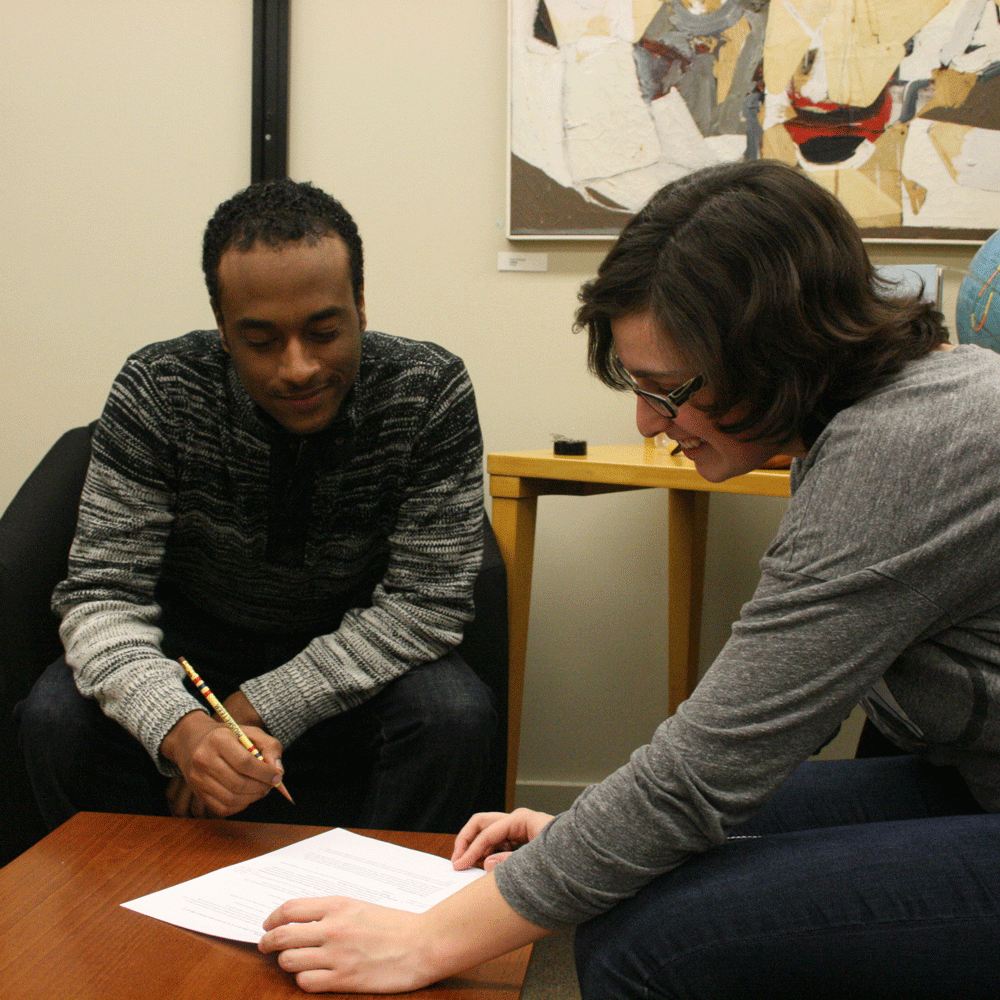 Cornell College student receives help from an academic tutor. 